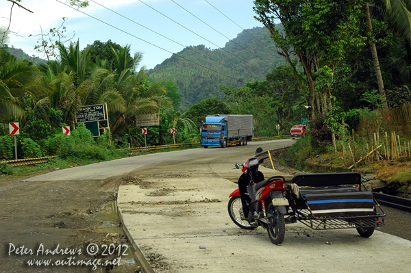 Now leaving the Davao Del Sur Engineering District the sign on the left indicates and entering the region of Cotabato North. More and more roadworks along the highway to Kidapawan City, Davao del Sur Province, Mindanao, Philippines. Photo copyright Peter Andrews, Outimage Australia.