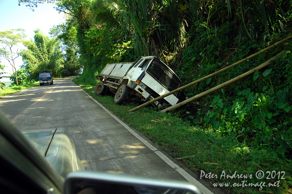 Another trucking disaster climbing a mountain pass on the President Roxas - Arakan Valley Road, Cotabato Province, Mindanao, Philippines. Photo copyright Peter Andrews, Outimage Australia.
