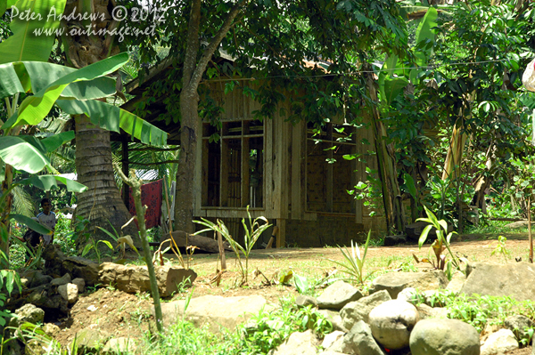 A house near Barangay, Cotabato Province, Mindanao, Philippines. Photo copyright Peter Andrews, Outimage Australia.