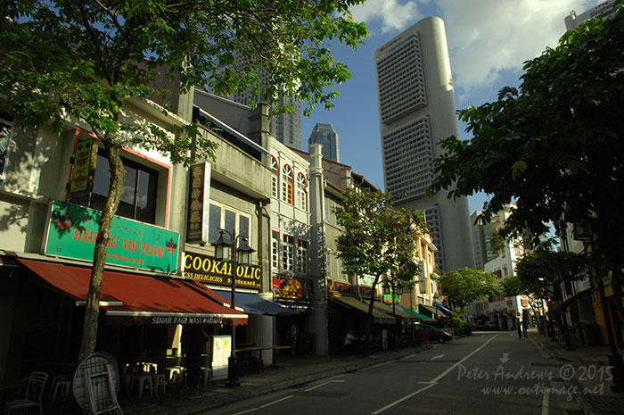 The restaurants and small bars along Circular Road at Boat Quay in Singapore prepare for another busy evening of trade. Photo © Peter Andrews / Outimage. Walking from Circular Road to Chinatown in Singapore as the city prepares for the Lunar New Year.