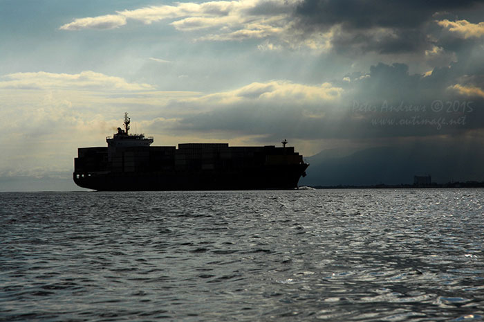 Shipping viewed from Paradise Island Beach on Samal Island.