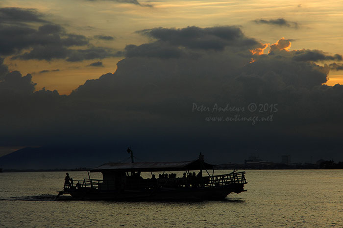 View towards Davao City Mindanao from Paradise Island Beach on Samal Island.