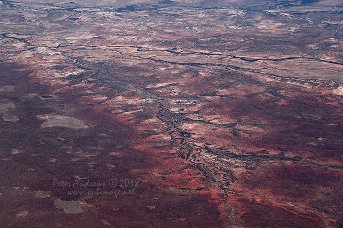 Dry river valleys near Muttaburra, Outback Queensland. 21°53'49.0"S 144°40'32.9"E. High altitude shots from a flight between Sydney Australia and Manila, Philippines.