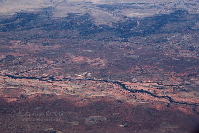 Dry river valleys near Muttaburra, Outback Queensland. 21°53'49.0"S 144°40'32.9"E. High altitude shots from a flight between Sydney Australia and Manila, Philippines.