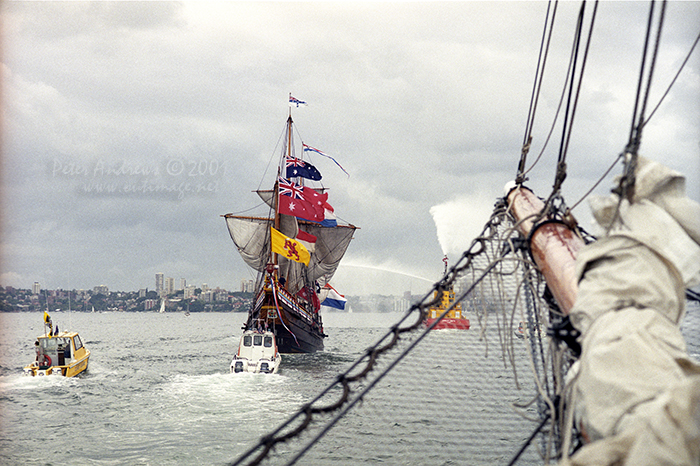 Duyfken under full sail, banners and flags approaches Sydney's sails of the Opera House, Saturday, March 3, 2001. 