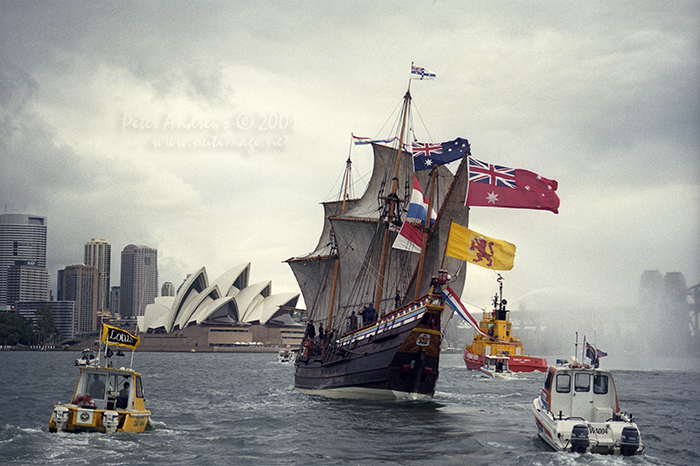 Duyfken under full sail, banners and flags approaches Sydney's sails of the Opera House, Saturday, March 3, 2001.