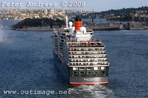 Queen Victoria slipping out of Sydney Harbour.