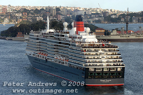 Queen Victoria slipping out of Sydney Harbour.