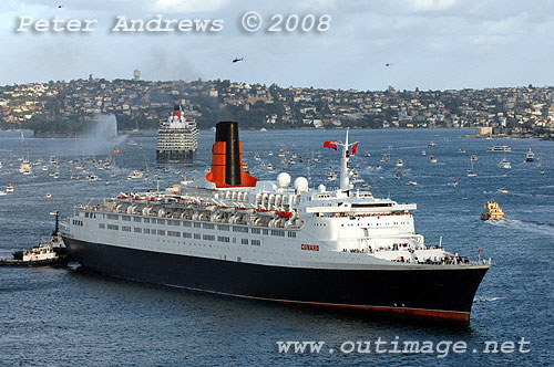 Queen Elizabeth II with Queen Victoria in the background leaving Sydney Harbour.