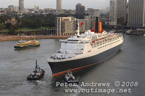 Queen Elizabeth II moving astern into Circular Quay.