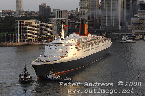 Queen Elizabeth II moving astern into Circular Quay.