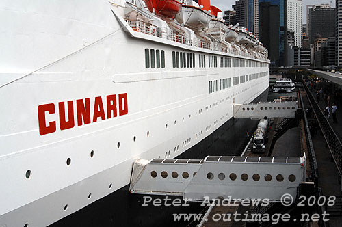 Looking along the port side of the Queen Elizabeth 2 towards the stern from the observation deck of the Overseas Passenger Terminal, Circular Quay Sydney.