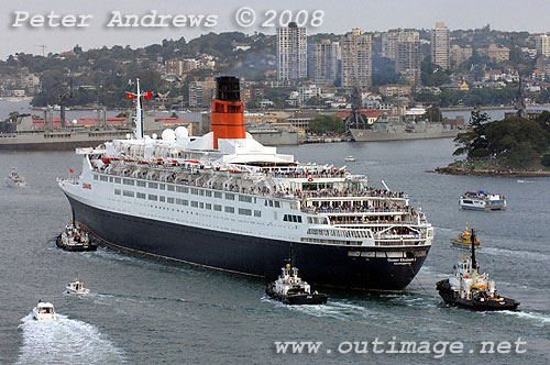 Queen Elizabeth 2 off Mrs Macquaries Point with Garden Island Navel Dockyard in the background on Sydney Harbour.