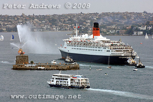 Queen Elizabeth 2 steaming past Fort Denison towards the the open sea.