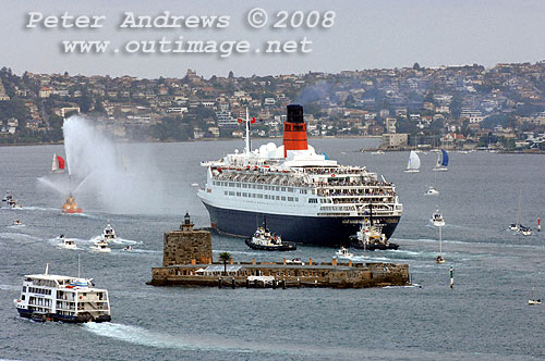 Queen Elizabeth 2 behind Fort Denison steaming towards the the open sea.