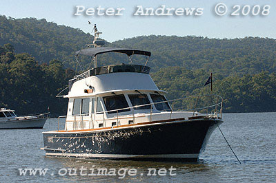 The 47 Eastbay Flybridge at anchor off Peat's Bight.