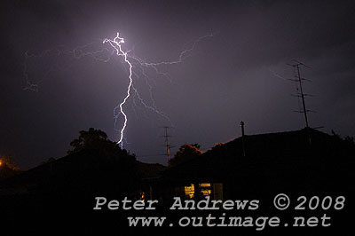Lightning above house.