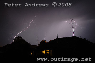 Lightning above house.