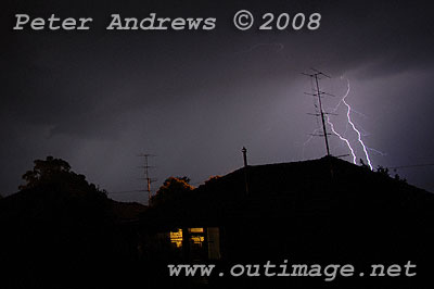 Lightning above house.