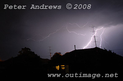 Lightning above house.