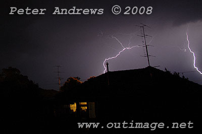 Lightning above house.