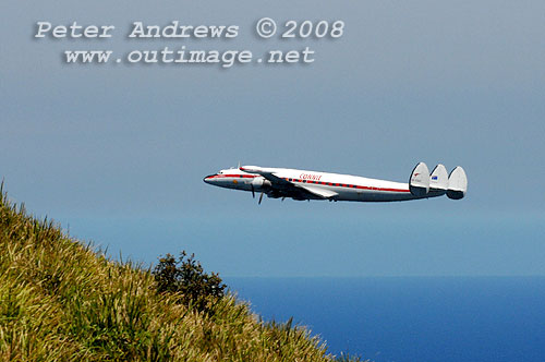 The Illawarra based Historical Aircraft Restoration Society's (HARS) Lockheed Super Constellation, Connie, flying over Stanwell Park, NSW Australia. Photo copyright Peter Andrews.