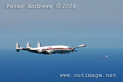 The Illawarra based Historical Aircraft Restoration Society's (HARS) Lockheed Super Constellation, Connie, flying over Stanwell Park, NSW Australia. Photo copyright Peter Andrews.