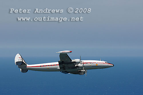 The Illawarra based Historical Aircraft Restoration Society's (HARS) Lockheed Super Constellation, Connie, flying over Stanwell Park, NSW Australia. Photo copyright Peter Andrews.