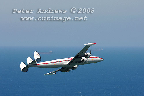 The Illawarra based Historical Aircraft Restoration Society's (HARS) Lockheed Super Constellation, Connie, flying over Stanwell Park, NSW Australia. Photo copyright Peter Andrews.