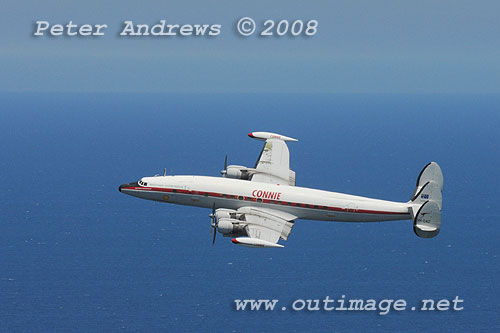 The Illawarra based Historical Aircraft Restoration Society's (HARS) Lockheed Super Constellation, Connie, flying over Stanwell Park, NSW Australia. Photo copyright Peter Andrews.