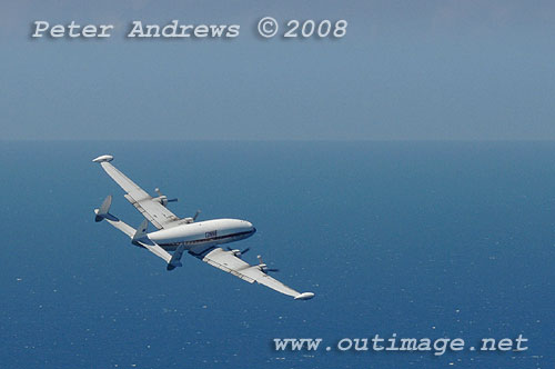 The Illawarra based Historical Aircraft Restoration Society's (HARS) Lockheed Super Constellation, Connie, flying over Stanwell Park, NSW Australia. Photo copyright Peter Andrews.