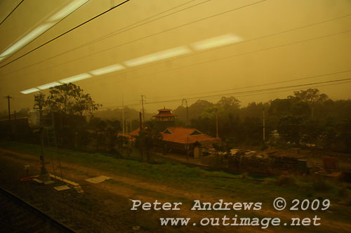 The Loftus Tram Museum, around 07:30 AEST, The lights from within the train are reflected on its window. Photo copyright Peter Andrews, Outimage.