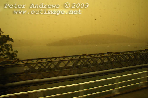 Crossing the Georges River, around 07:38 AEST, with dust building up on the outside of the train. Photo copyright Peter Andrews, Outimage.