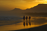 Illawarra's Corrimal Beach at sunset with Mount Kembla left and Mount Keira right, in the background. Photo copyright Peter Andrews, Outimage.