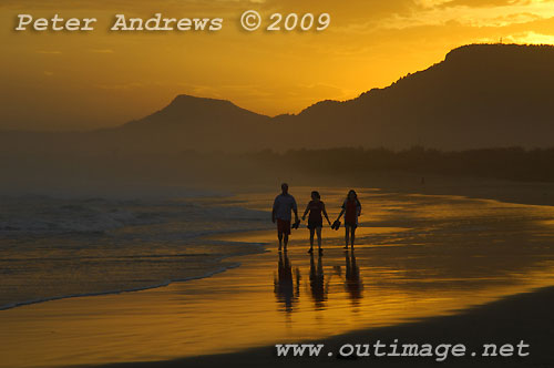 Illawarra's Corrimal Beach at sunset with Mount Kembla left and Mount Keira right, in the background. Photo copyright Peter Andrews, Outimage.