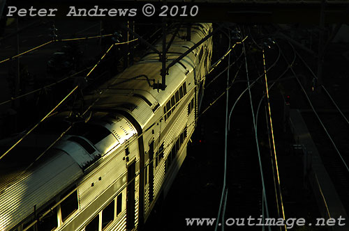 Evening train to Sydney leaving Newcastle. Photo copyright Peter Andrews, Outimage Publications.