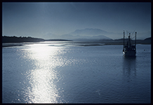 Access to an article about this photo of a prawn trawler at anchor in the Hinchinbrook Channel in North Queensland, Australia.