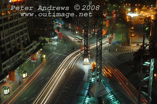 Late night traffic flow from Pitt Street top right into Broadway (bottom left), at Sydney's Railway Square. Photo copyright Peter Andrews 2008, Outimage Publications.