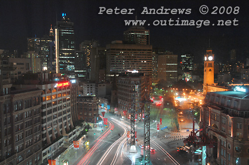 Late night traffic flowing between Broadway and the main street in Sydney, George Street at Sydney's Railway Square. Photo copyright Peter Andrews 2008, Outimage Publications.