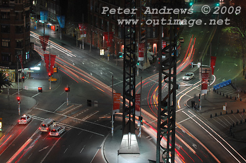 Late night traffic flowing from Lee Street bottom right into George Street top left and Pitt Street top right, at Sydney's Railway Square. Photo copyright Peter Andrews 2008, Outimage Publications.