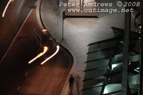 A taxi picks up a fare at the Broadway bus stop at Sydney's Railway Square. Photo copyright Peter Andrews 2008, Outimage Publications.