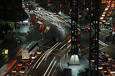 Pedestrians wait for the traffic at Sydney's Railway Square. Photo copyright Peter Andrews, Outimage Publications.