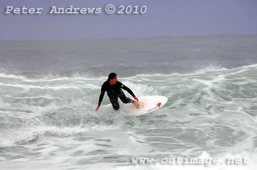 Surfin on the back of an East Coast Low at Coledale, New South Wales Australia. Photo copyright Peter Andrews, Outimage. 