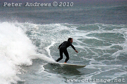 Surfin on the back of an East Coast Low at Coledale, New South Wales Australia. Photo copyright Peter Andrews, Outimage. 