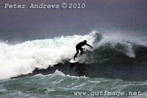 Surfin on the back of an East Coast Low at Coledale, New South Wales Australia. Photo copyright Peter Andrews, Outimage. 