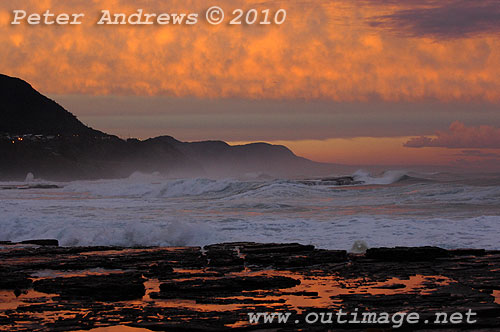 Surfin on the back of an East Coast Low at Coledale, New South Wales Australia. Photo copyright Peter Andrews, Outimage. 
