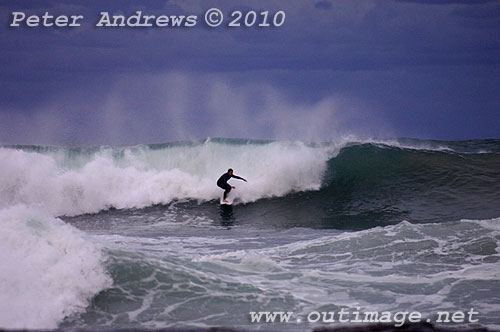 Surfin on the back of an East Coast Low at Coledale, New South Wales Australia. Photo copyright Peter Andrews, Outimage. 