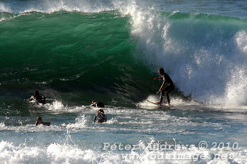 A mid August Saturday morning surf at Location 2, New South Wales Illawarra Coast, Australia. Photo copyright Peter Andrews.