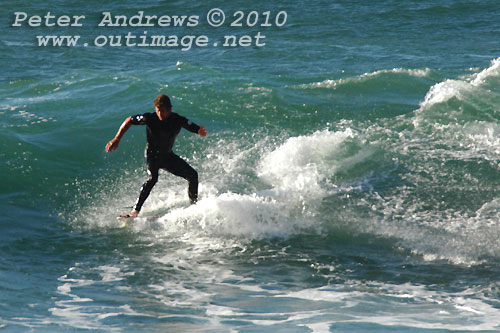 A mid August Saturday morning surf at Location 2, New South Wales Illawarra Coast, Australia. Photo copyright Peter Andrews.