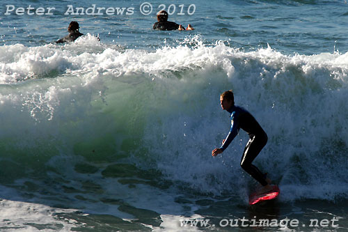 A mid August Saturday morning surf at Location 2, New South Wales Illawarra Coast, Australia. Photo copyright Peter Andrews.